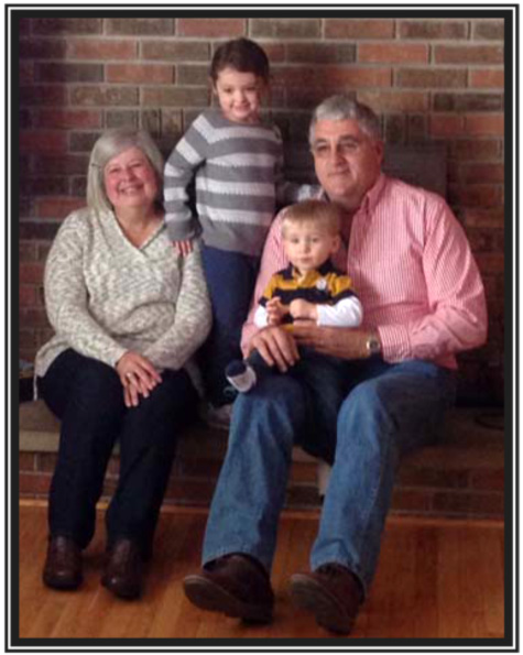 Joe and Cathy Young with grandchildren